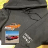 Black hoodie with an orange classic coupe embroidered from the photo shown, and 09/06/11 WP&KR on the sleeve