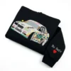 Folded black hoodie with a detailed white drift car in pink, yellow and teal graffiti livery and a Be Safe sleeve