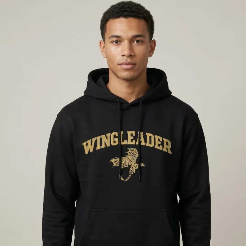 Man wearing bookish Wingleader embroidered hoodie in black unisex fit