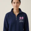 Custom nurse bow embroidered quarter zip in navy with BSN RN credentials and personalized name