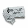Folded heather grey sweatshirt with black medical icons over nurse life script and Liway RN on the sleeve
