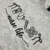 Angled close-up of black outline bows, Rx bottle, stethoscope, syringe and bandages above nurse life script