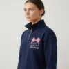 Personalized nurse bow quarter zip in navy front view showing pink bow heart stethoscope and name