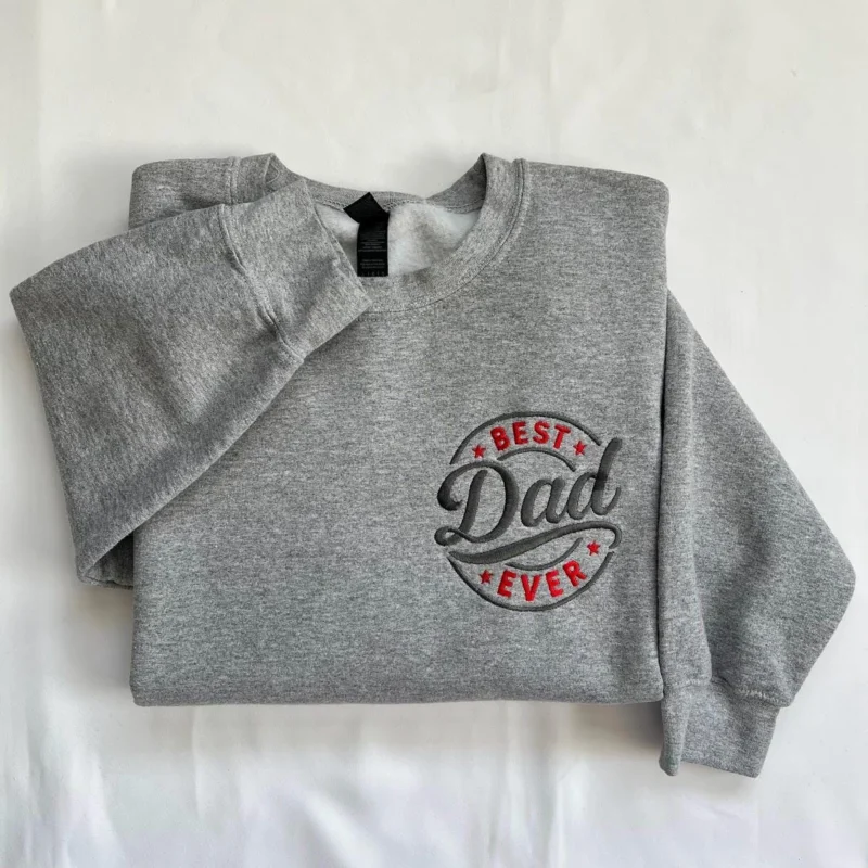 Sport grey sweatshirt with a round left-chest badge reading BEST Dad EVER in red and dark grey embroidery