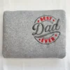 Folded sport grey sweatshirt with the BEST Dad EVER circle badge embroidered in red and charcoal thread